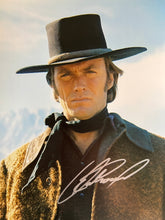 Clint Eastwood signed movie photo. GFA Authenticated